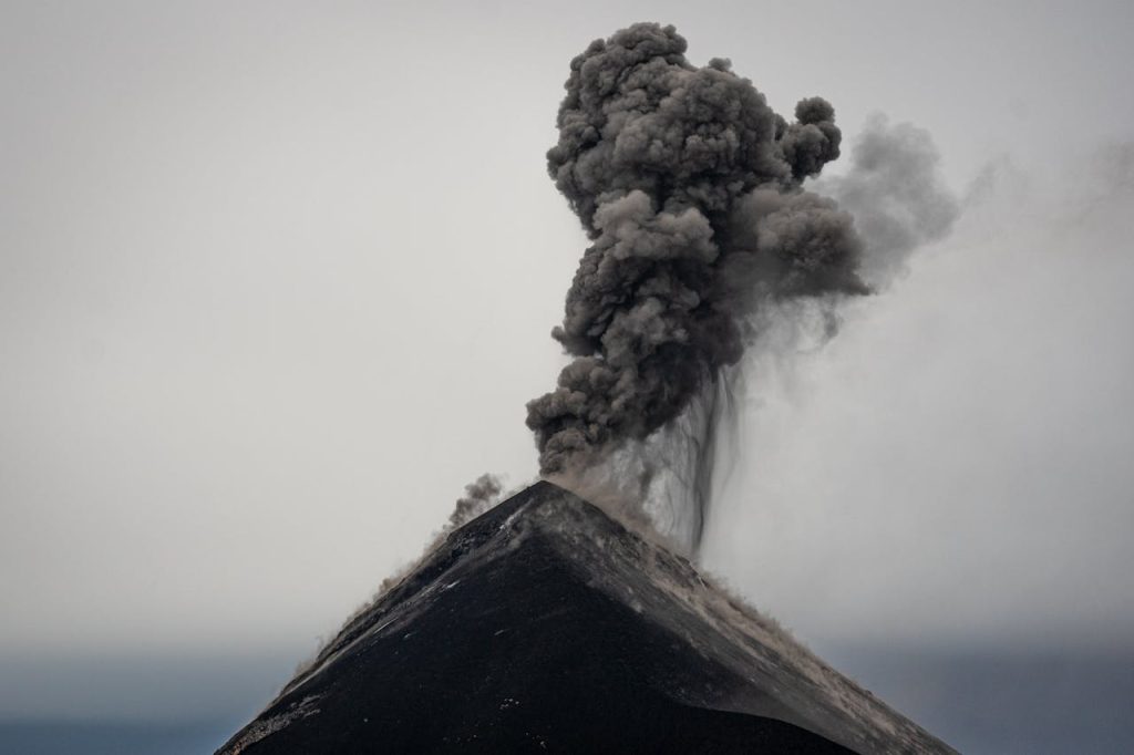 Ash and smoke erupt from Acatenango volcano in Guatemala, capturing natures raw power.